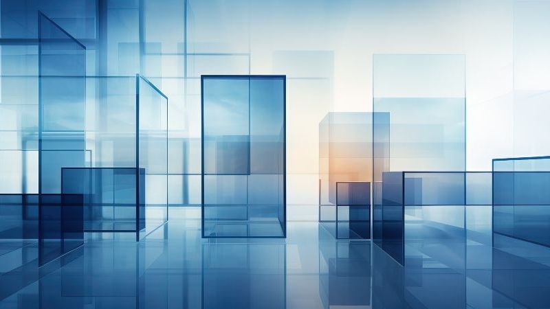 © Adobestock.com - Steve Das Bild zeigt eine moderne, abstrakte Architektur aus transparenten blauen Glasflächen und geometrischen Formen erzeugt eine ruhige, lichtdurchflutete Atmosphäre.