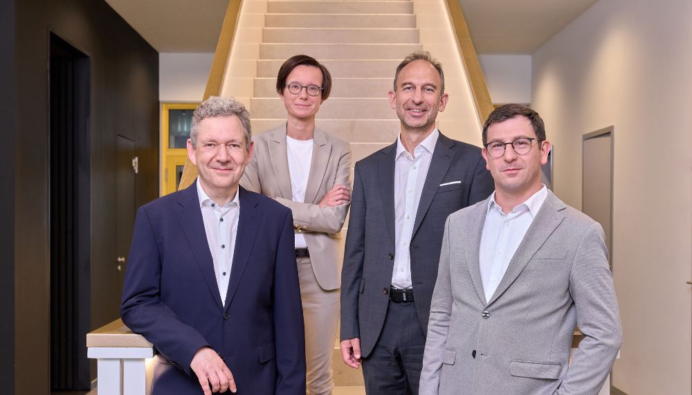 The management of PtJ looks at the camera.